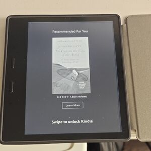 Amazon Kindle Second Gen Oasis - Strong Battery And Two Cases Included.